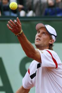 Italy's Andreas Seppi serves to Spain's