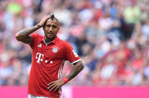 Bayern Munich's Chilian midfielder Arturo Vidal reacts during the German first division Bundesliga football match between FC Bayern Munich and 1 FC Cologne in Munich, southern Germany, on October 1, 2016. / AFP / CHRISTOF STACHE / RESTRICTIONS: DURING MATCH TIME: DFL RULES TO LIMIT THE ONLINE USAGE TO 15 PICTURES PER MATCH AND FORBID IMAGE SEQUENCES TO SIMULATE VIDEO. == RESTRICTED TO EDITORIAL USE == FOR FURTHER QUERIES PLEASE CONTACT DFL DIRECTLY AT + 49 69 650050 (Photo credit should read CHRISTOF STACHE/AFP/Getty Images)